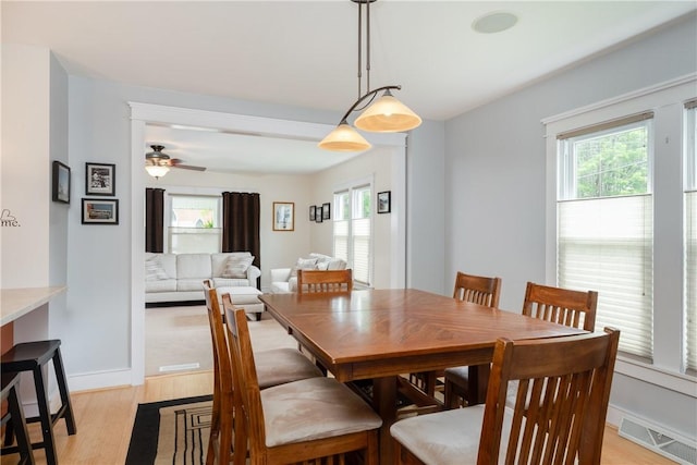 121 Reynolds Ave, Corning City, NY 14830 - dining room featuring light wood-style floors and a ceiling fan