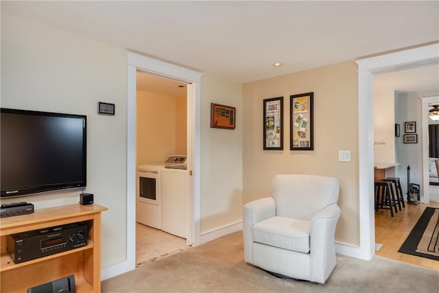 121 Reynolds Ave, Corning City, NY 14830 - sitting room featuring washing machine and clothes dryer, light carpet, and recessed lighting