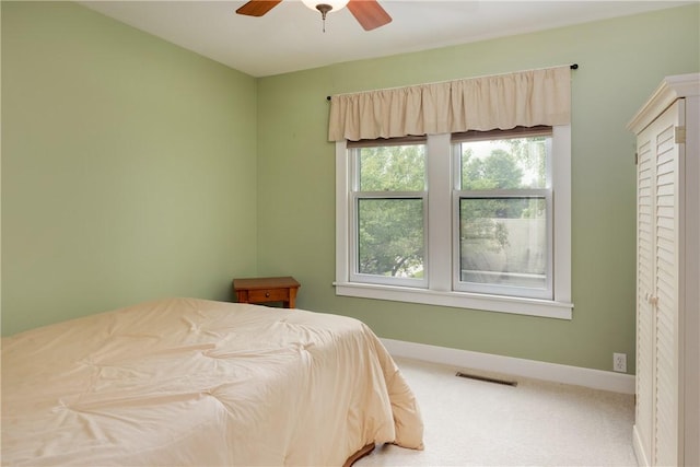 121 Reynolds Ave, Corning City, NY 14830 - carpeted bedroom featuring baseboards and ceiling fan