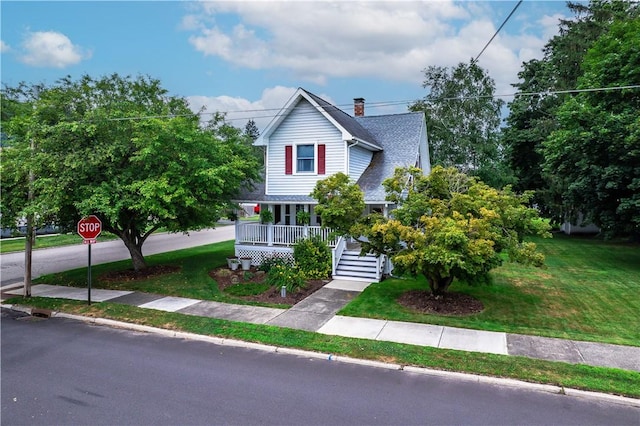 121 Reynolds Ave, Corning City, NY 14830 - view of front of house with covered porch, a front yard, roof with shingles, a chimney, and stairs