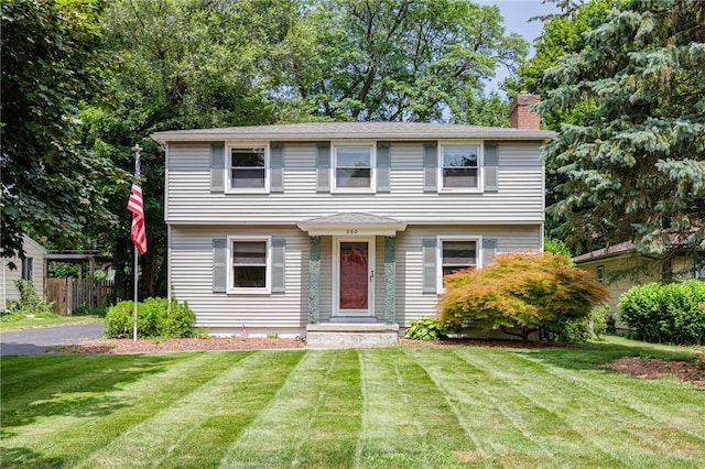 360 San Gabriel Dr, Rochester, NY 14610 - colonial inspired home featuring a chimney