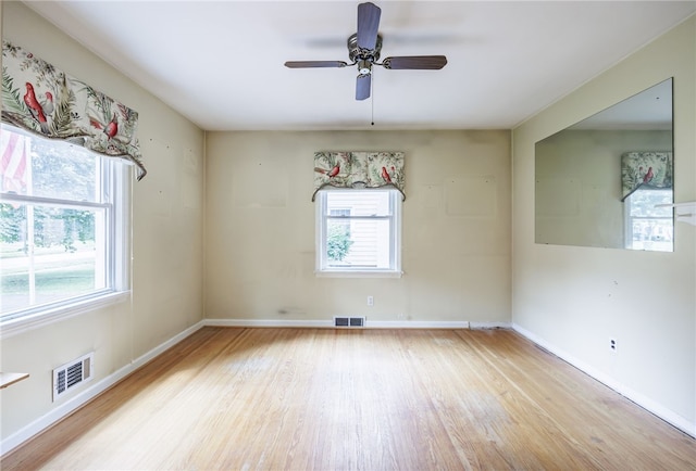 360 San Gabriel Dr, Rochester, NY 14610 - spare room featuring wood finished floors and ceiling fan