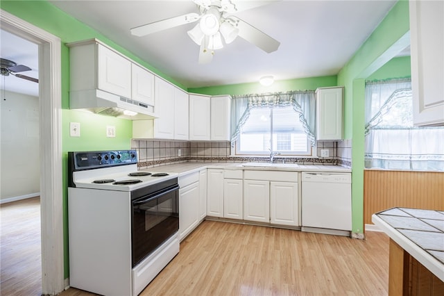 360 San Gabriel Dr, Rochester, NY 14610 - kitchen featuring a ceiling fan, white appliances, light wood-style flooring, under cabinet range hood, and tasteful backsplash