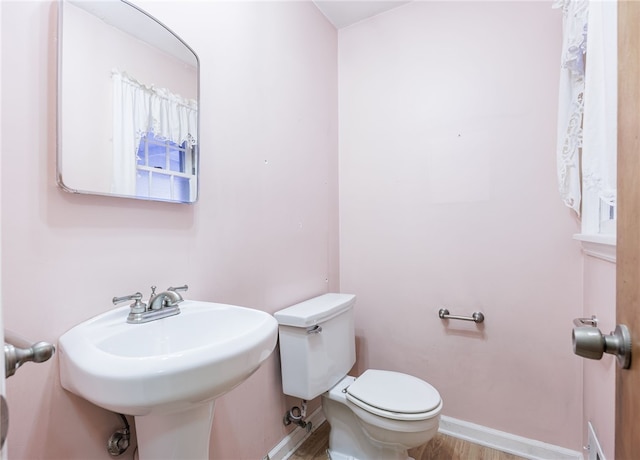 360 San Gabriel Dr, Rochester, NY 14610 - half bathroom featuring toilet and wood finished floors