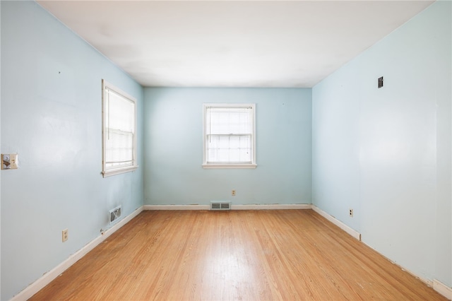 360 San Gabriel Dr, Rochester, NY 14610 - unfurnished room featuring light wood-style flooring and healthy amount of natural light