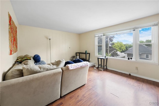 1018-20 Ackerman Ave, Syracuse, NY 13210 - living area featuring wood finished floors and baseboards