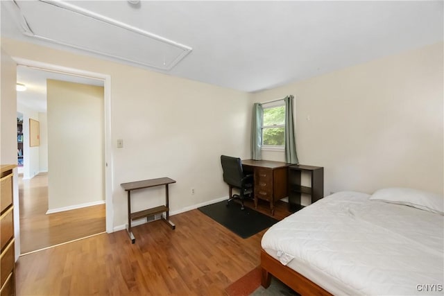 1018-20 Ackerman Ave, Syracuse, NY 13210 - bedroom featuring attic access and wood finished floors
