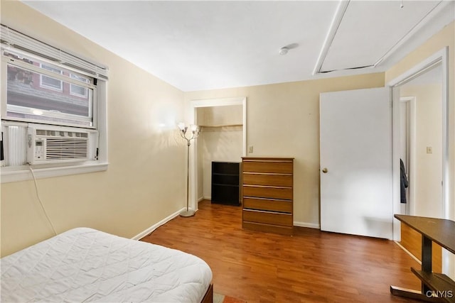 1018-20 Ackerman Ave, Syracuse, NY 13210 - bedroom with wood finished floors, a spacious closet, and cooling unit