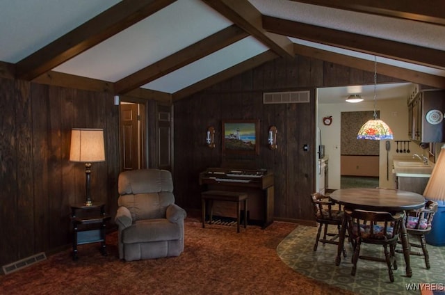 573 Locust St, North Tonawanda, NY 14120 - carpeted living area with wooden walls and a sink