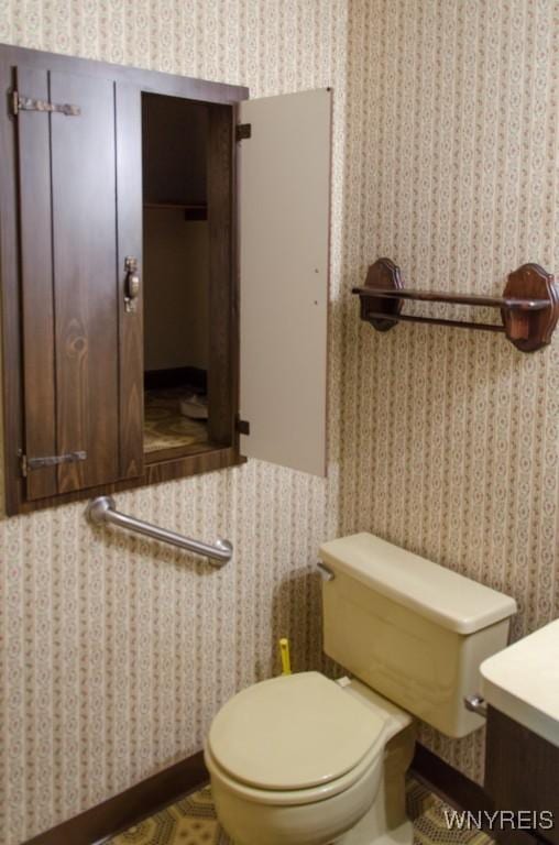 573 Locust St, North Tonawanda, NY 14120 - bathroom with vanity and wallpapered walls
