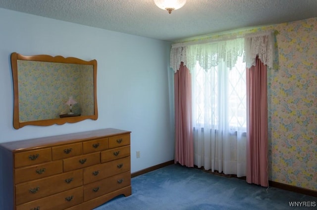 573 Locust St, North Tonawanda, NY 14120 - bedroom featuring a textured ceiling and carpet floors