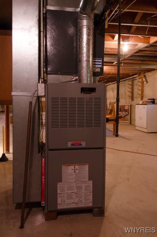 573 Locust St, North Tonawanda, NY 14120 - utilities featuring washer / clothes dryer and heating unit