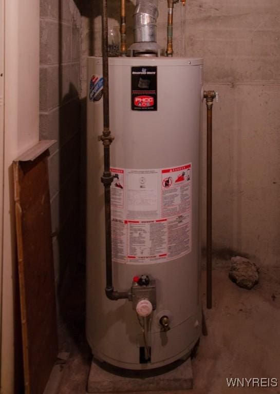573 Locust St, North Tonawanda, NY 14120 - utility room featuring water heater