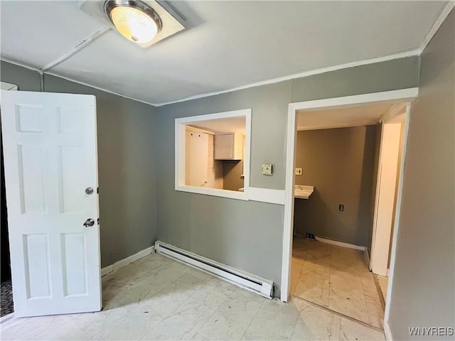 97 Kail St, Buffalo, NY 14207 - unfurnished room featuring a baseboard heating unit and marble look tiles