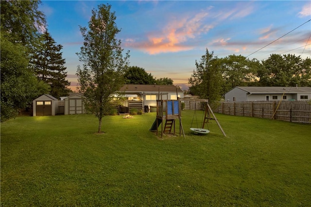 111 Crimson Bramble Rd, Henrietta, NY 14623 - fenced backyard with a shed and a playground