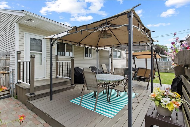 111 Crimson Bramble Rd, Henrietta, NY 14623 - wooden terrace with a gazebo, outdoor dining area, and grilling area