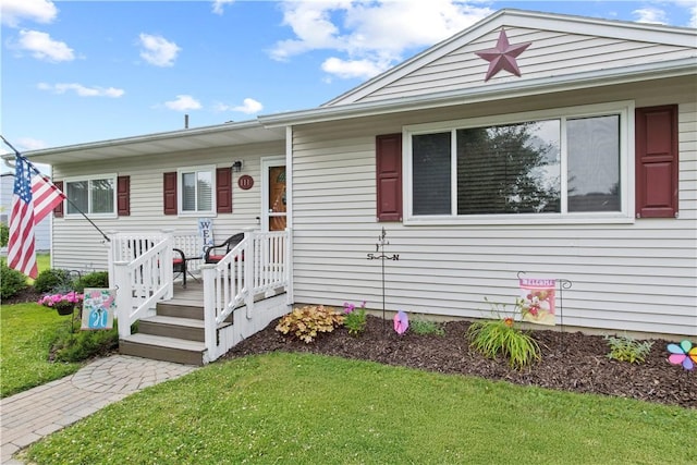 111 Crimson Bramble Rd, Henrietta, NY 14623 - view of front of house with a front yard and a deck
