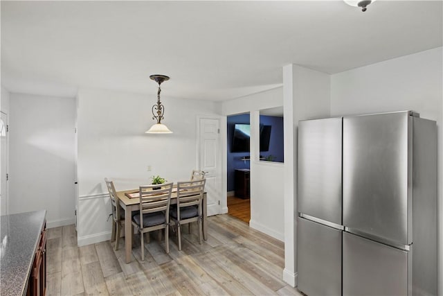 111 Crimson Bramble Rd, Henrietta, NY 14623 - dining area featuring light wood-style floors and baseboards