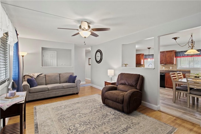 111 Crimson Bramble Rd, Henrietta, NY 14623 - living room featuring ceiling fan and light wood finished floors