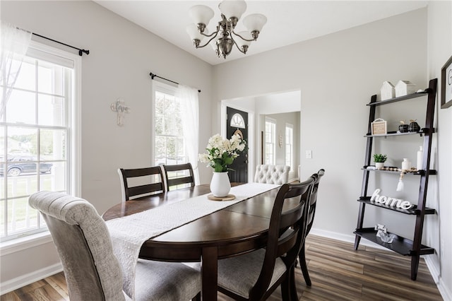 2023 Rainbow Ln, Lima, NY 14485 - dining room with a chandelier and wood finished floors