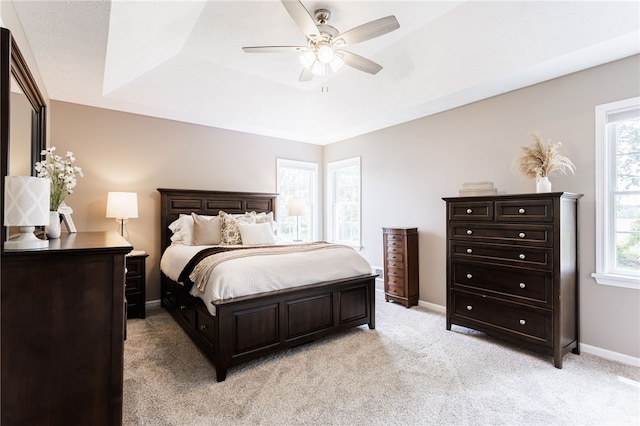 2023 Rainbow Ln, Lima, NY 14485 - bedroom with light colored carpet and ceiling fan