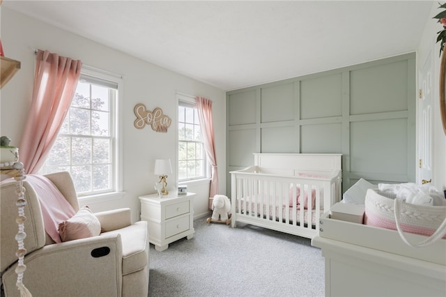 2023 Rainbow Ln, Lima, NY 14485 - carpeted bedroom with a decorative wall