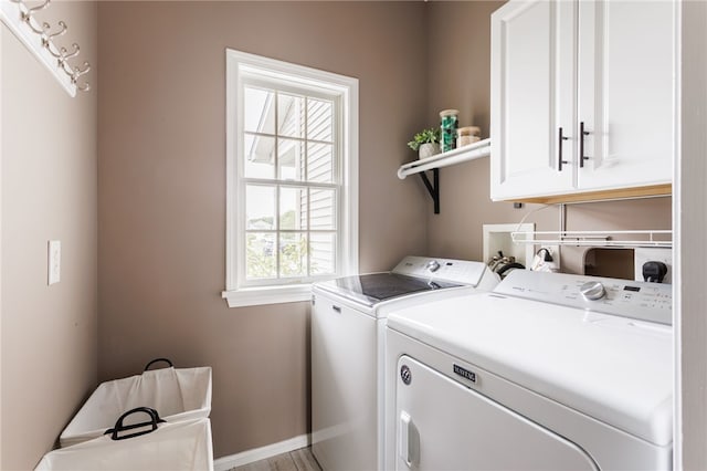 2023 Rainbow Ln, Lima, NY 14485 - laundry room with cabinet space and washer and clothes dryer