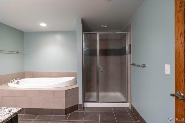 149 Swan St Unit 310, Buffalo, NY 14203 - bathroom with a shower stall, tile patterned flooring, and a garden tub