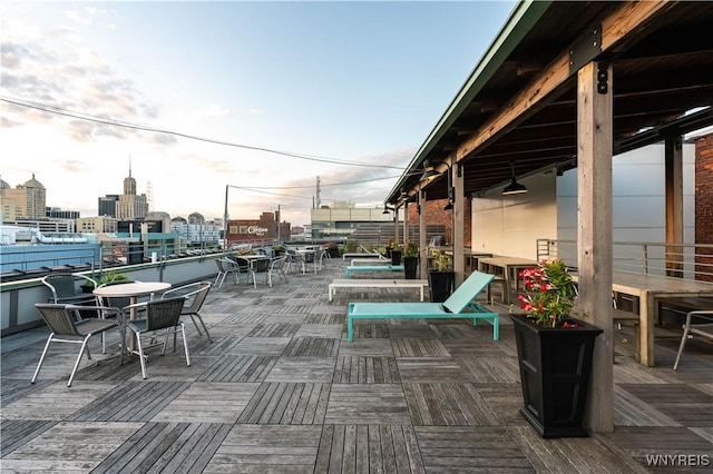 149 Swan St Unit 310, Buffalo, NY 14203 - view of patio with outdoor dining area, a city view, and a deck