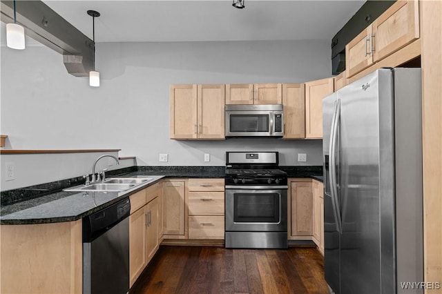 149 Swan St Unit 310, Buffalo, NY 14203 - kitchen featuring light brown cabinets, stainless steel appliances, dark wood finished floors, a peninsula, and hanging light fixtures
