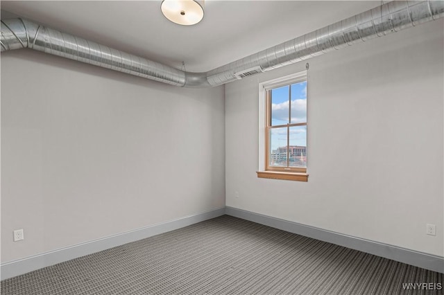 149 Swan St Unit 310, Buffalo, NY 14203 - empty room featuring baseboards and carpet floors
