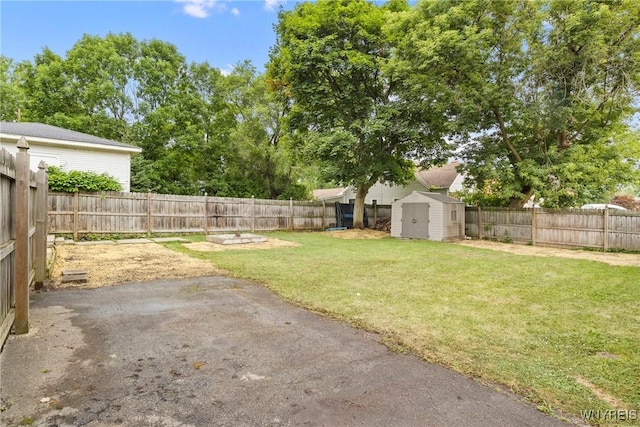 540 Longmeadow Rd, Amherst, NY 14226 - fenced backyard featuring a storage unit and a patio