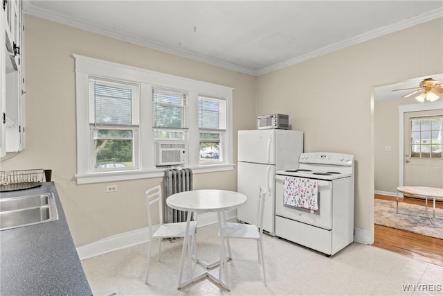 540 Longmeadow Rd, Amherst, NY 14226 - kitchen with white electric stove, ornamental molding, radiator heating unit, white cabinets, and ceiling fan