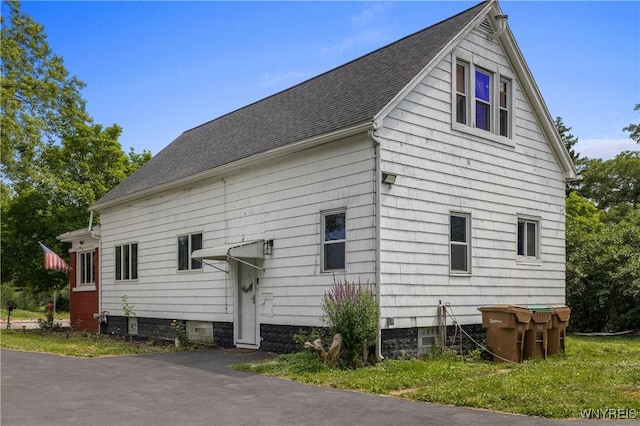 1142 Harlem Rd, Cheektowaga, NY 14227 - view of home's exterior with roof with shingles