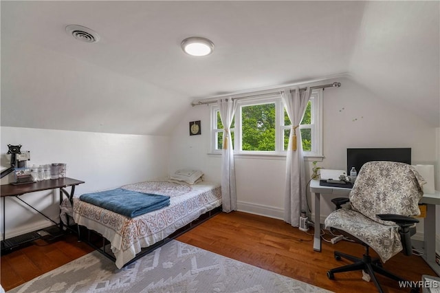 1142 Harlem Rd, Cheektowaga, NY 14227 - bedroom featuring lofted ceiling, wood finished floors, and a desk