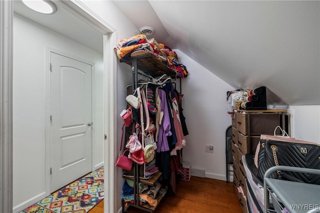 1142 Harlem Rd, Cheektowaga, NY 14227 - walk in closet with vaulted ceiling and wood finished floors