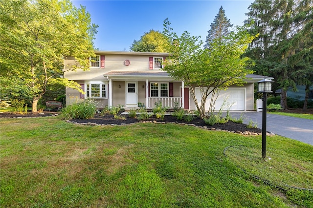 1225 Majestic Way, Webster, NY 14580 - traditional home featuring driveway, covered porch, a garage, and a front lawn
