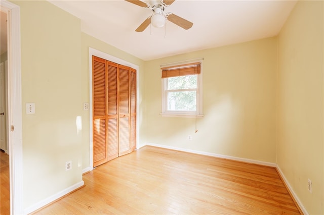 1225 Majestic Way, Webster, NY 14580 - unfurnished bedroom featuring light wood-type flooring, a closet, and a ceiling fan