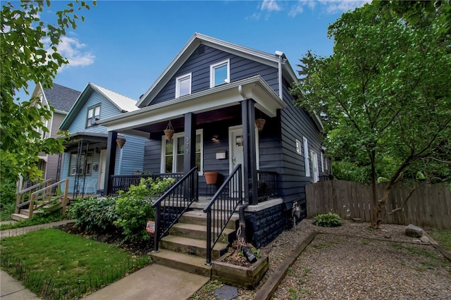 373 Rhode Island St, Buffalo, NY 14213 - bungalow featuring covered porch and a metal roof