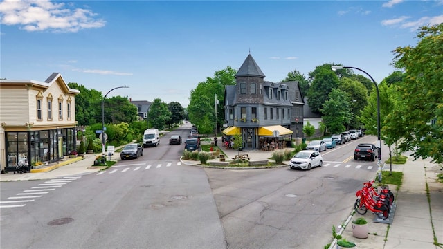 373 Rhode Island St, Buffalo, NY 14213 - view of asphalt road featuring sidewalks, street lights, and curbs