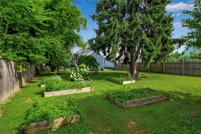 373 Rhode Island St, Buffalo, NY 14213 - fenced backyard featuring a garden