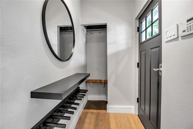 373 Rhode Island St, Buffalo, NY 14213 - foyer entrance featuring wood finished floors and a textured wall