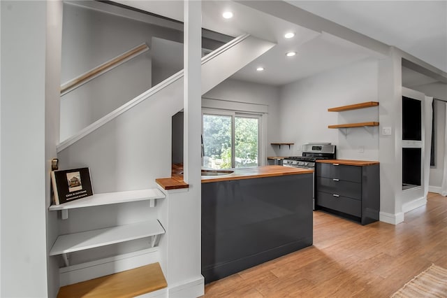 373 Rhode Island St, Buffalo, NY 14213 - kitchen featuring butcher block counters, open shelves, recessed lighting, gas range, and light wood-style flooring