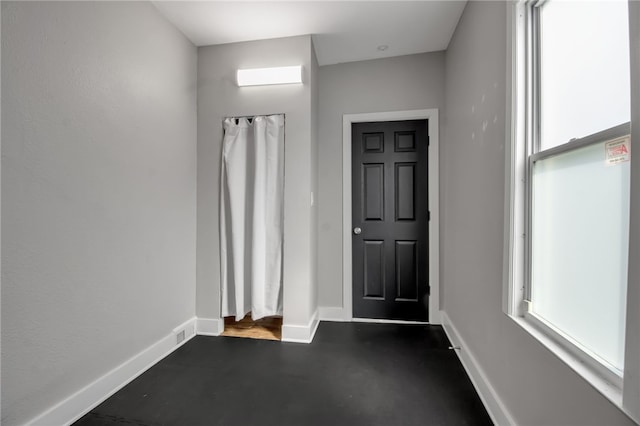 373 Rhode Island St, Buffalo, NY 14213 - foyer entrance featuring healthy amount of natural light and concrete flooring