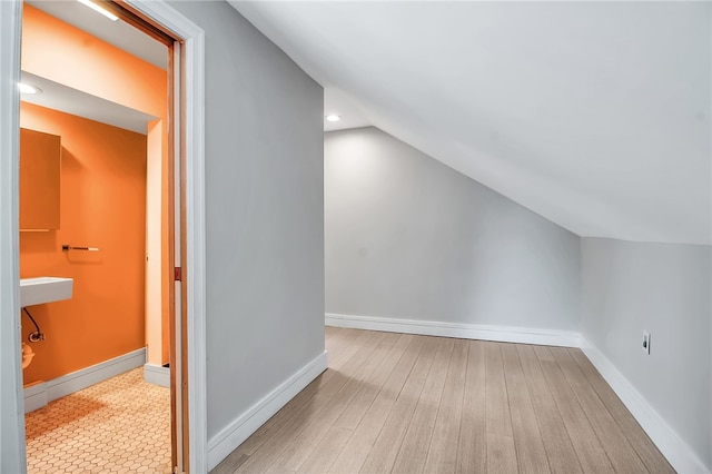 373 Rhode Island St, Buffalo, NY 14213 - additional living space with lofted ceiling and wood finished floors