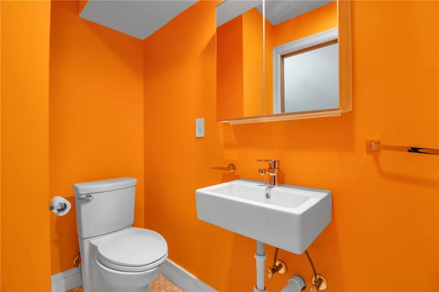 373 Rhode Island St, Buffalo, NY 14213 - half bath featuring baseboards and tile patterned floors