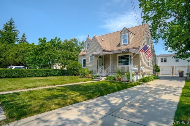235 Wagner Ave, Cheektowaga, NY 14212 - cape cod home featuring a front lawn, roof with shingles, and a garage