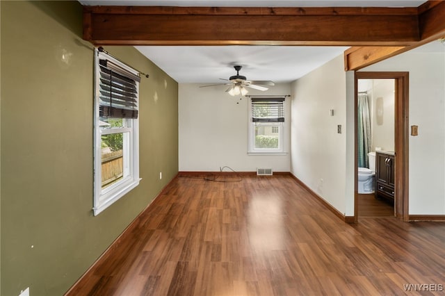 235 Wagner Ave, Cheektowaga, NY 14212 - empty room with wood finished floors, ceiling fan, and beam ceiling