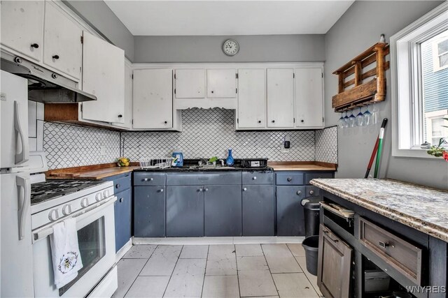 49 Massachusetts Ave, Buffalo, NY 14213 - kitchen with white appliances, white cabinets, under cabinet range hood, and tasteful backsplash