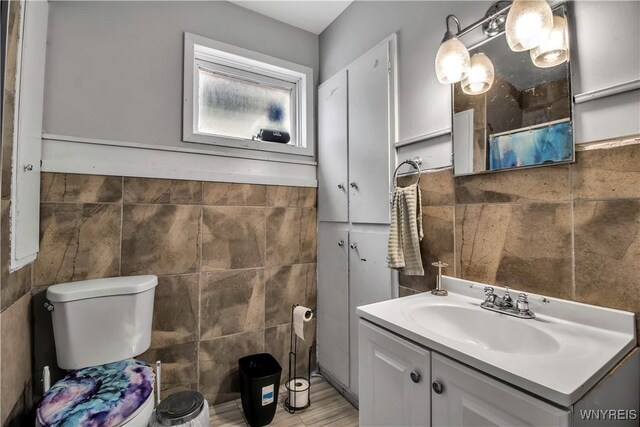 49 Massachusetts Ave, Buffalo, NY 14213 - bathroom with tile walls and vanity